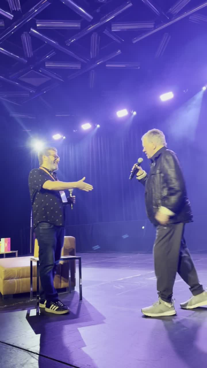 Eric Cohen greeting William Shatner on stage at Montreal Comiccon